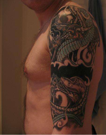 Dragon 1/2 sleeve tattoo