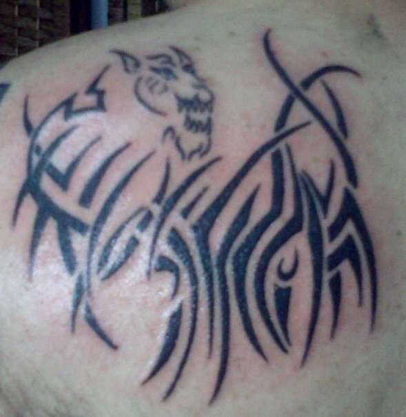 Tribal Upper Back tattoo