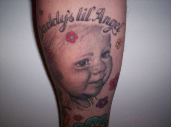 my "LIL ANGEL" tattoo