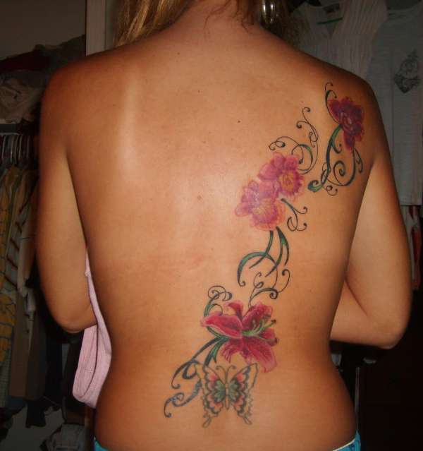 flowers on back tattoo