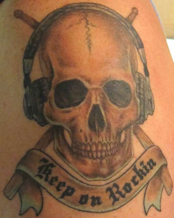 Keep on Rockin Skull tattoo