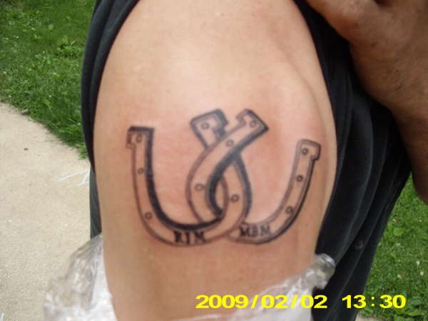hourse shoes with initials in it tattoo