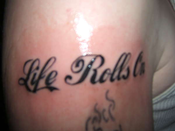 i did this on my buddys arm (life rolls on tattoo