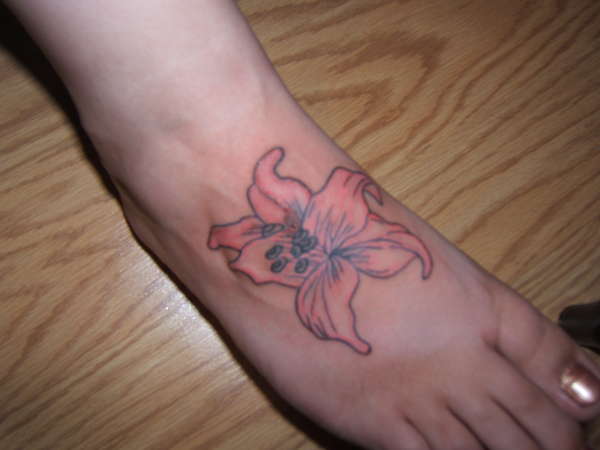i finished this flower on my sisters foot tattoo