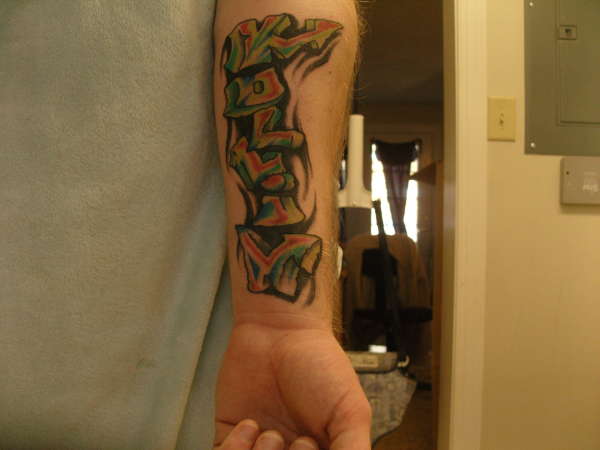 My sons' name "Kollin" tattoo