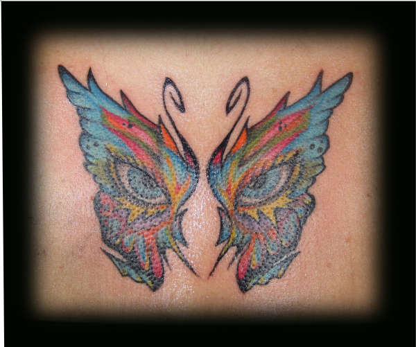 eyes buttterfly tattoo