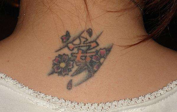 Neck Tat tattoo
