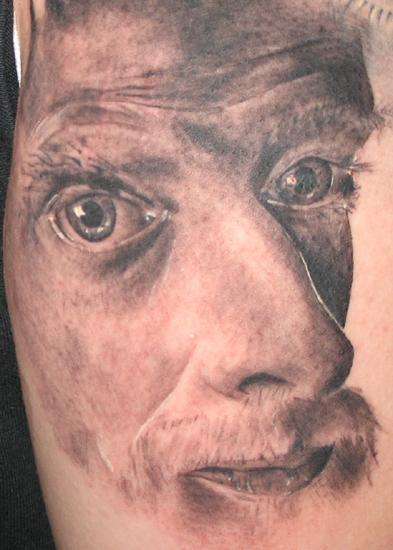 escher portrait tattoo