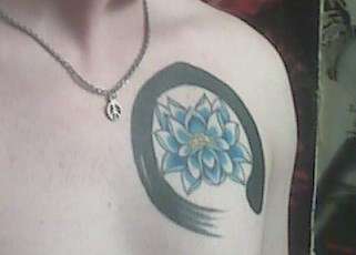 Lotus with Enso tattoo