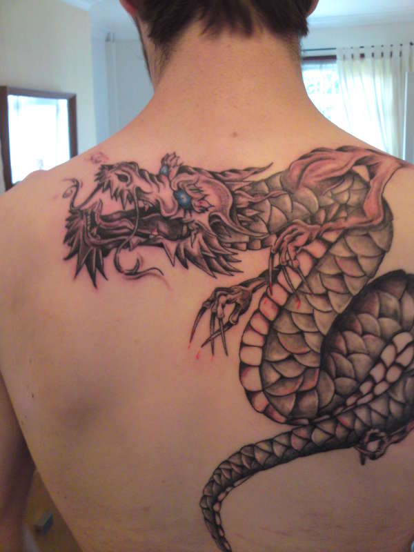 black and grey dragon tattoo