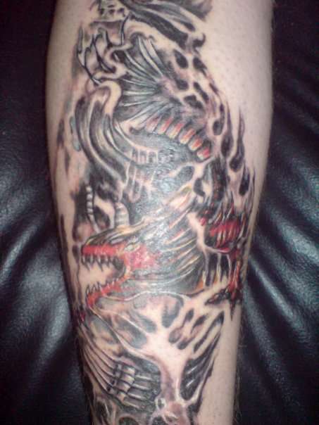 My second dragon on back of leg tattoo