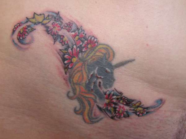 unicorn and flowers tattoo