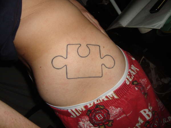 jigsaw puzzle piece tattoo