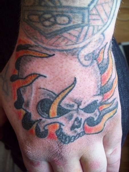 skull hand tattoo