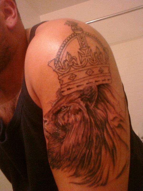 Crown,lion.flag tattoo