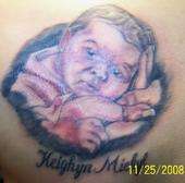 baby portrait tattoo