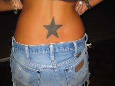 Star on back tattoo