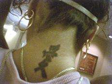 neck tat tattoo