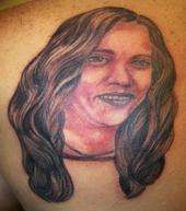 pissed-off portrait tattoo