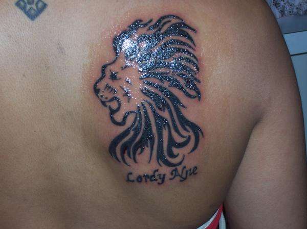 lion w/lettering tattoo