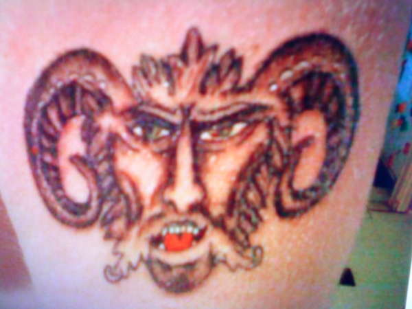 Kane's Demon tattoo