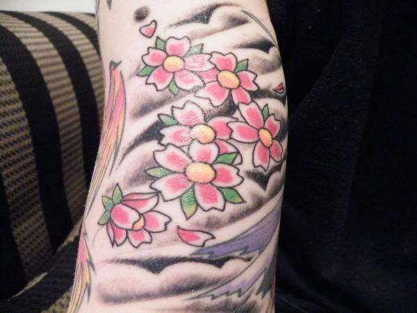 Cherry Blossoms and Wind Bars tattoo