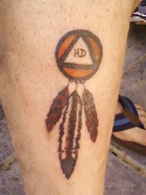 Indian feathers tattoo