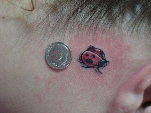 lady bug tattoo