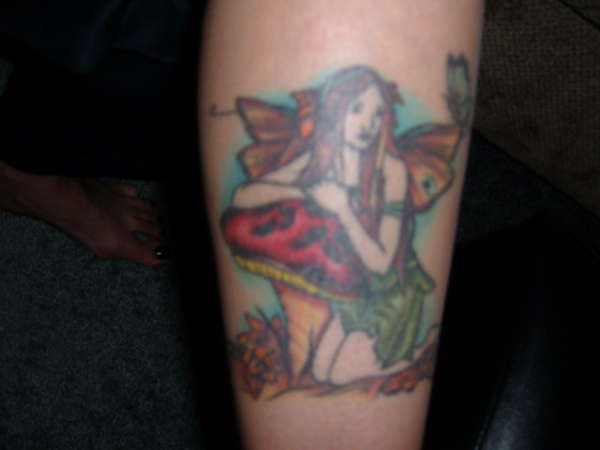 Fairy and mushroom tattoo