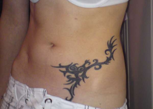 hip tribal tattoo