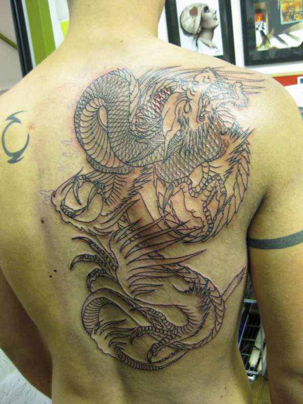 Dragon after first 3 hours - unfinished tattoo
