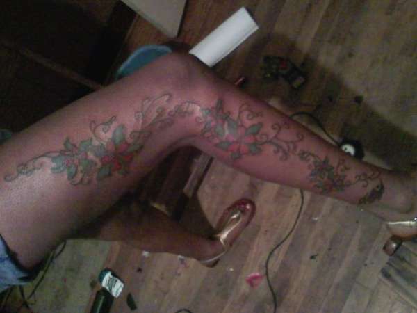 rose vine tattoo