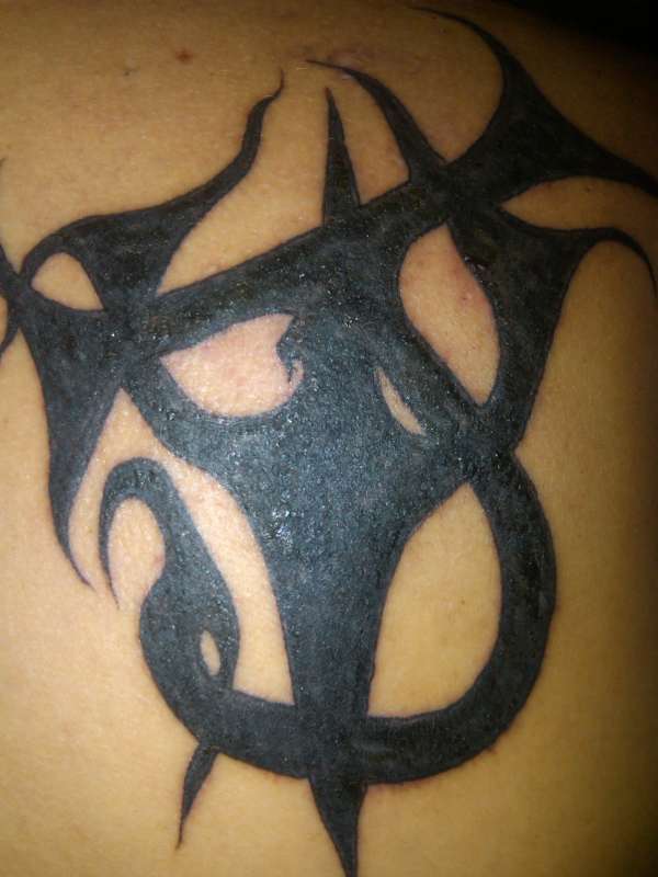 J W (overlapped) the W is a Pitch fork tattoo