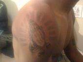 cross and rays tattoo