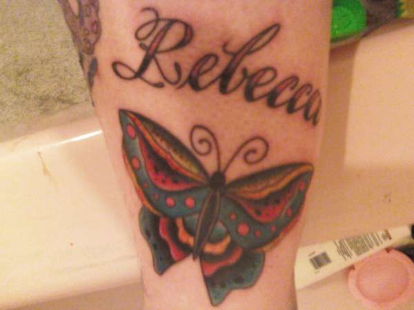 Butterfly tat, on left leg. tattoo