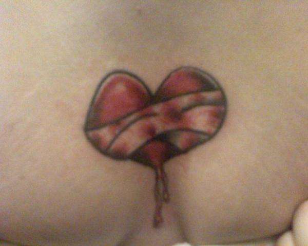 Bleeding and Bandaged heart tattoo