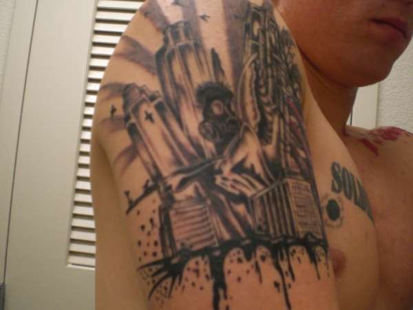 Crazy guy/building scene other side tattoo