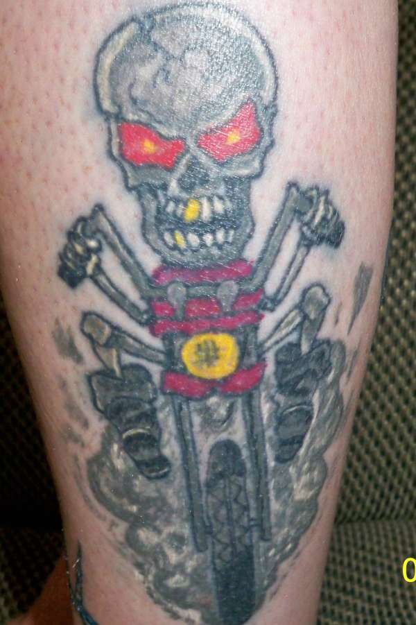 skeleton sporting his harley tattoo