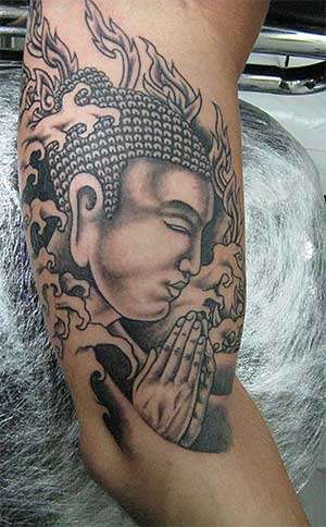 Praying Buddha tattoo