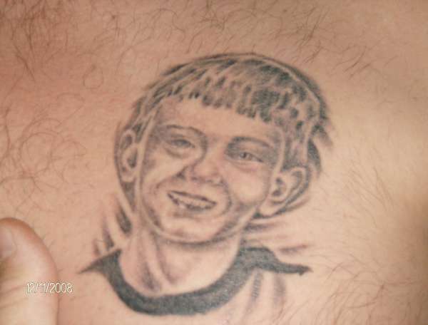 our sons portrait tattoo