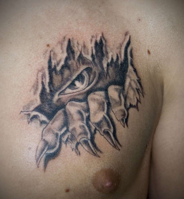 Demon Chest Tear tattoo