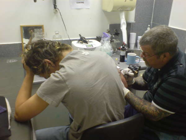 Tattoos hurt !! tattoo