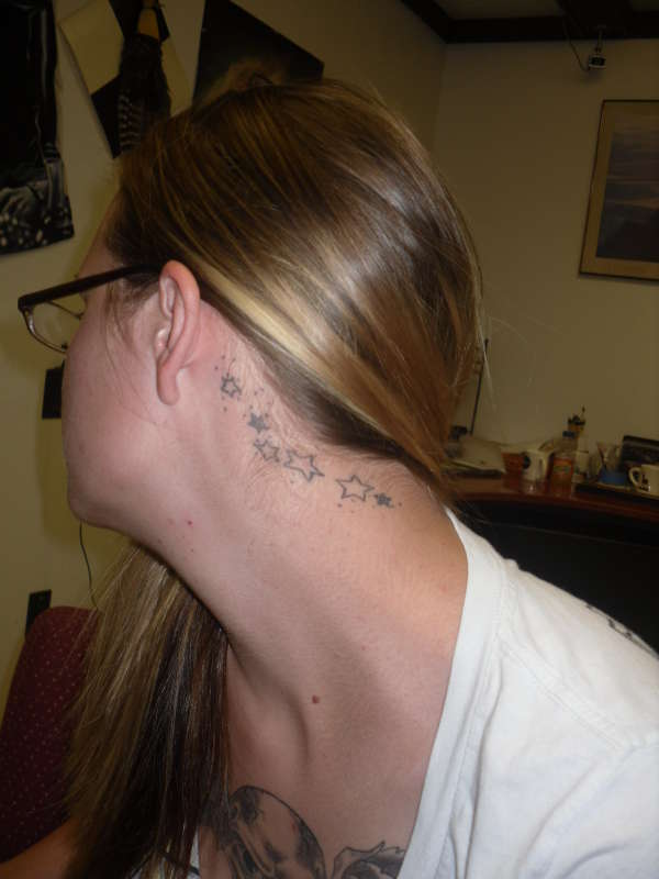stars behind the ear tattoo