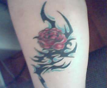 rose with tribal tattoo