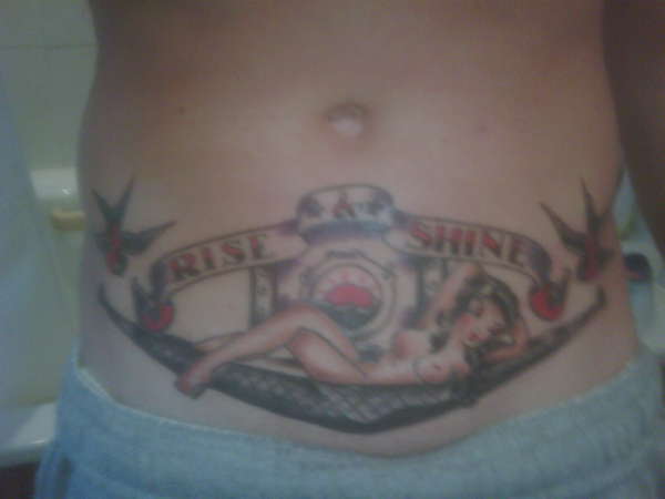 sailor jerry stomach piece tattoo
