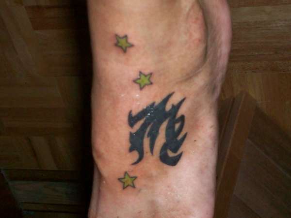 virgo sign on foot tattoo