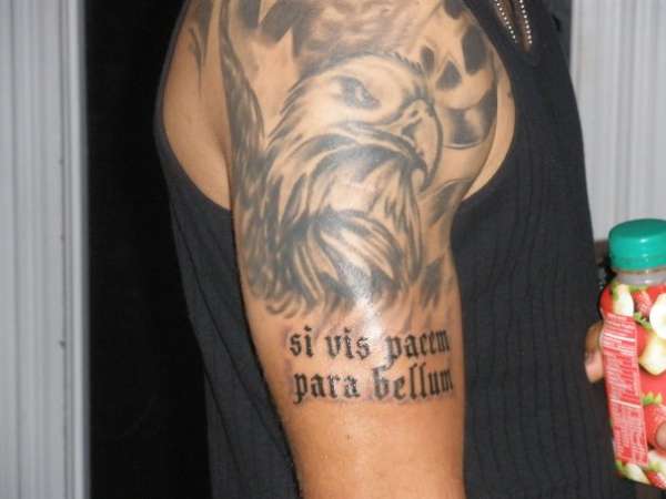 eagle with flag and latin saying tattoo
