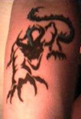left forearm dragon tattoo
