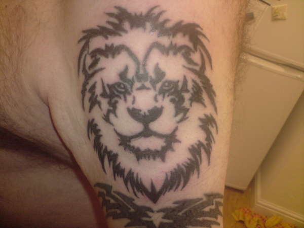 lion on my uncle tattoo