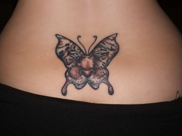 white tiger inside butterfly tattoo